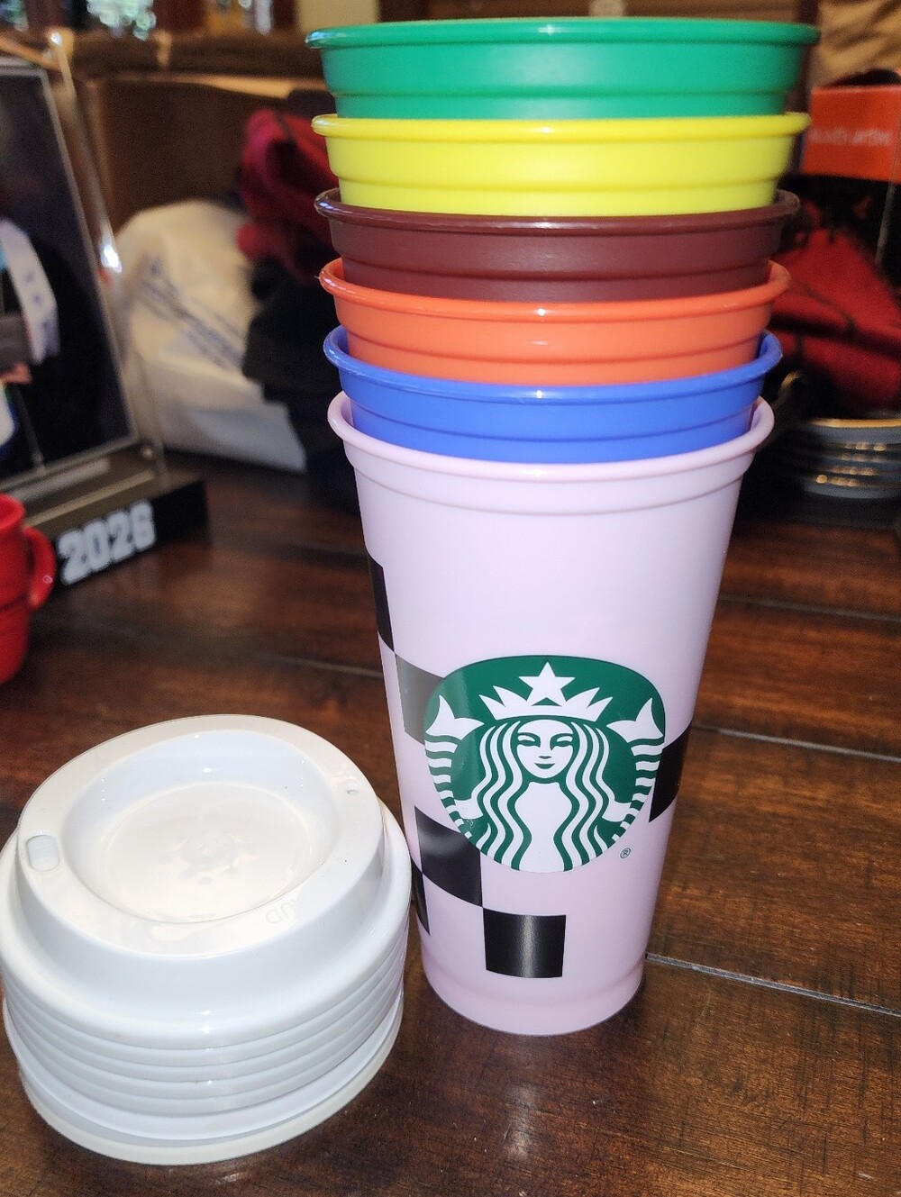 6 Starbucks Plastic Tumblers with Stack of Lids